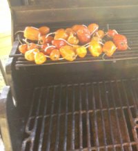 Habanero peppers on grill for pheasant fajita salsa